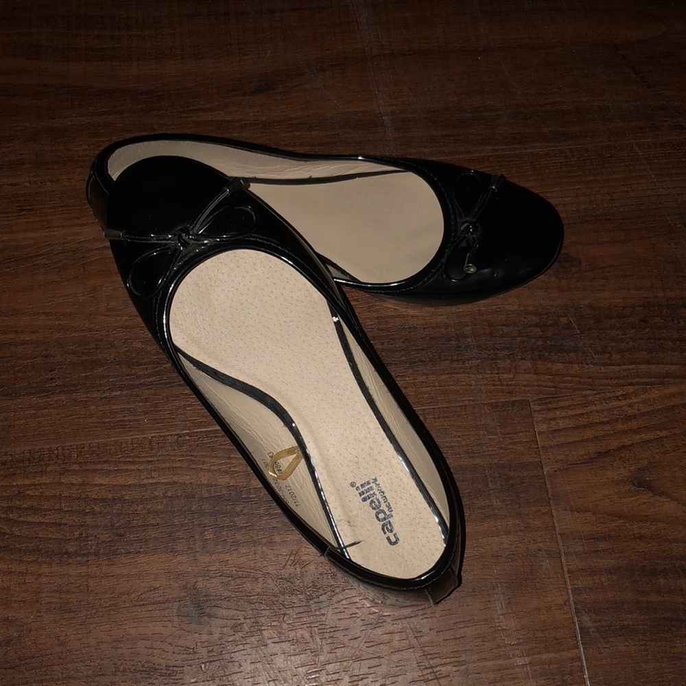All black slip on flats
